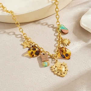Gold stainless steel chunky necklace with leopard print pendants and vintage star sun charms