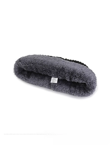 Detail of warm grey fleece lining on acrylic knitted hat showing soft texture and thickness