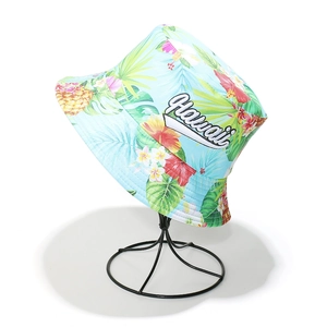 Detail of Hawaii embroidery on light blue tropical print cotton canvas sun bucket hat