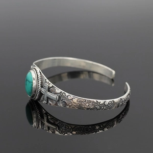 Vintage bohemian turquoise open cuff bracelet with engraved cross and floral patterns