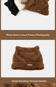 Detail showing the fluffy cat ear knit hat texture and the small metal logo tag decoration