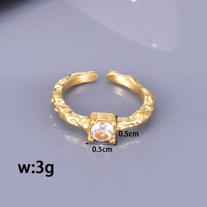 Titanium steel ring with irregular texture and round white zircon gemstone inlay