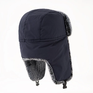 Navy winter trapper hat with thick grey faux fur lining and windproof ear flaps