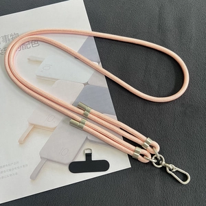 Detail of pink 8mm braided phone lanyard with adjustable silver metal buckles and pad