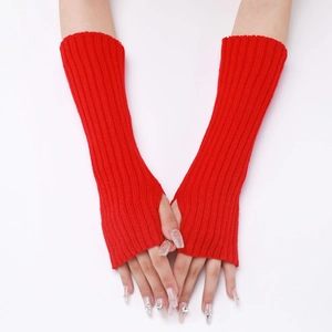 Detailed view of red knitted arm warmers featuring ribbed texture and fingerless design