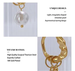 Macro detail of asymmetric 18K gold plated titanium earring with baroque faux pearls