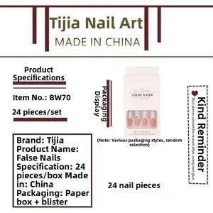 Detail of 24pcs long coffin press-on nails set with elegant pearls and bow design