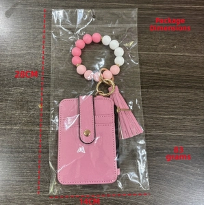 Pink PU leather card holder with silicone bead wristlet, size 28x14cm, weighing 83g