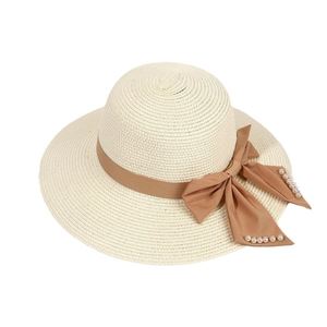 French style wide brim straw sun hat for women featuring a brown ribbon and pearl bow