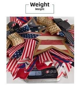 Macro shot of American patriotic wreath with stars and stripes ribbons weighing 314 grams