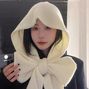 Knitted hooded scarf for women in cream beige with a large decorative bow detail