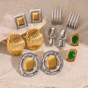 Retro stainless steel cat eye stone stud earrings in gold and silver finish