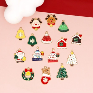 Detailed set of 14 colorful enamel Christmas charms featuring reindeer and bells
