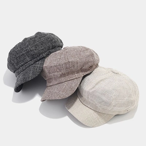 British style newsboy caps in black, brown, and beige with classic woven texture
