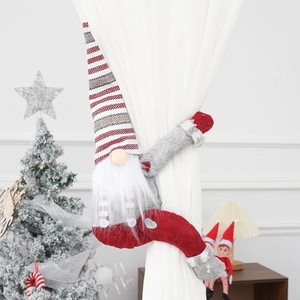 Christmas gnome curtain tieback with red and grey striped hat for holiday home decor