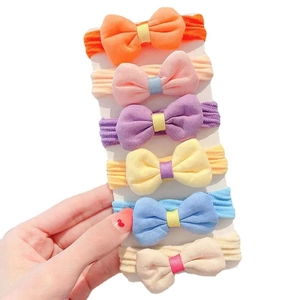 Set of six high-elastic fabric bow hair ties for girls in multiple soft pastel colors