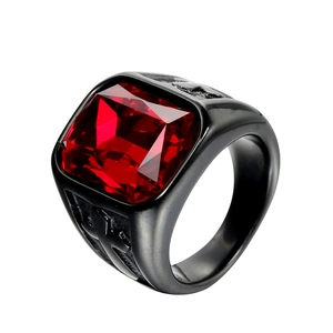 Vintage punk black stainless steel ring with a large square red gemstone in high detail
