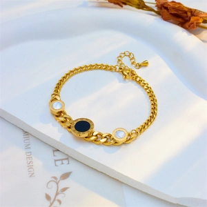 Golden stainless steel Cuban chain bracelet with black Roman numeral and shell charms