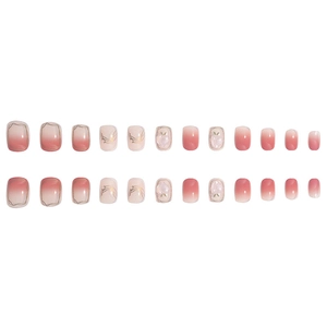 Pink gradient press-on nails with 3D peach charms and gold wire details, short square shape