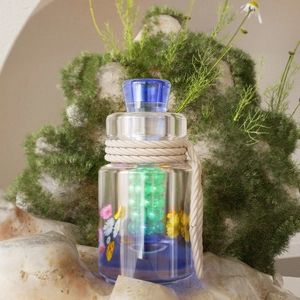 Macro detail of silicone drifting bottle mold with glowing beads and dried flowers inside