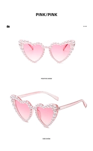Detailed front and side views of pink heart-shaped sunglasses with white pearl embellishments