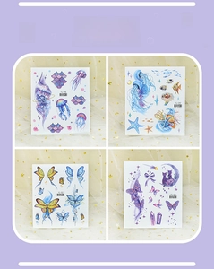 Detail set of waterproof dreamlike cartoon tattoo stickers with glitter butterfly and jellyfish
