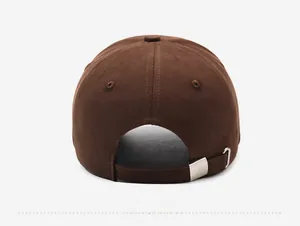 Detail of dark brown cotton baseball cap back with premium silver metal adjustable buckle