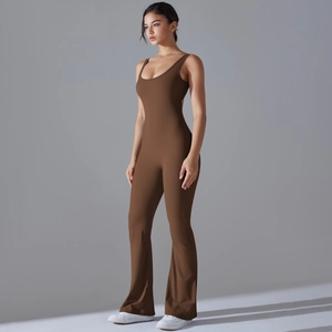 Detail view of dark brown flared yoga jumpsuit with thin straps and open back design