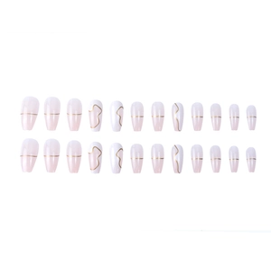 Pink and white gradient press-on nails with elegant gold lines and wave patterns