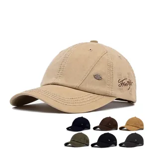 Vintage Baseballkappe aus Baumwolle mit Freestyle-Stickerei und seitlicher Plakette