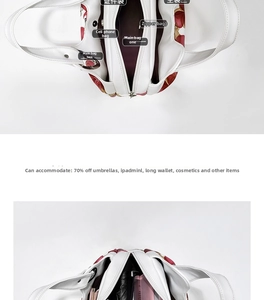 Detailed interior view of multi-compartment white floral handbag with organized sections