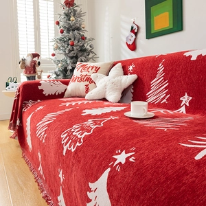 Festive red Christmas sofa cover with white snowflake and tree patterns for home decor