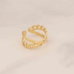 Detailed close-up of double-layer gold stainless steel ring with textured chain pattern