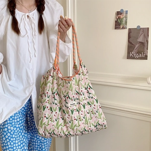Detail of tulip floral canvas tote bag showing delicate fabric texture and pattern