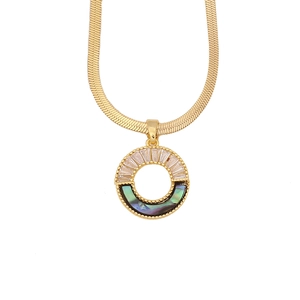 Detailed view of a gold snake chain necklace with colorful abalone shell and zircon pendant