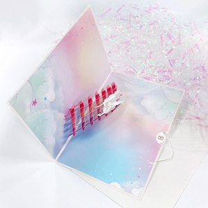 Detail of 3D birthday card featuring dreamlike cloud and star papercraft structure