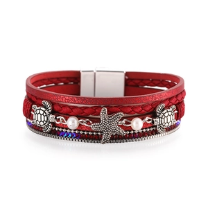 Close-up of red multi-layer leather bracelet with silver turtle and starfish charms