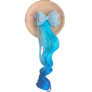 Children sequin bow hair clip with blue gradient long curly hair extension on tray