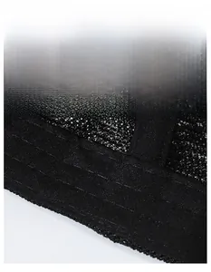 Detail of breathable mesh fabric and wide moisture-wicking sweatband on black baseball cap