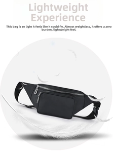 Lightweight black nylon waist bag detail with double zippers and adjustable buckle