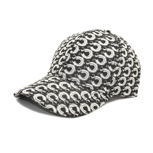 Vintage baseball cap featuring monochrome jacquard horseshoe patterns and a curved brim