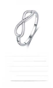Macro shot of S925 sterling silver infinity ring band showing clear S925 hallmark