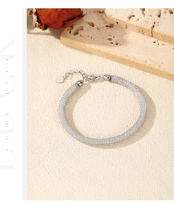 Detail of S925 sterling silver mesh woven bracelet with lobster clasp and heart pendant