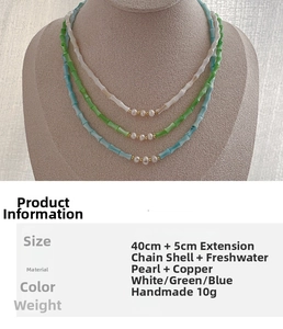 Detail of handcrafted bamboo-shaped beads and freshwater pearl necklace in three colors