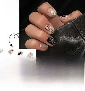 Detail of JP2675 Halloween press-on nails with spider webs and stars patterns