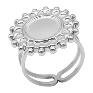 Detail of adjustable silver stainless steel ring featuring a sunburst geometric round top