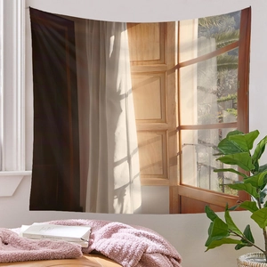 Detail of wall tapestry showing warm sunlight through window on white sheer curtains