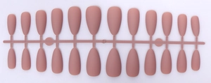 Detail view of 24 pieces of matte almond press-on nails in morandi nude pink color