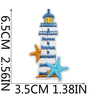Lighthouse and starfish embroidery patch with dimensions 6.5cm x 3.5cm shown on white background