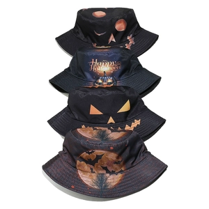 Detail of Halloween bucket hats featuring pumpkin face and spooky landscape prints